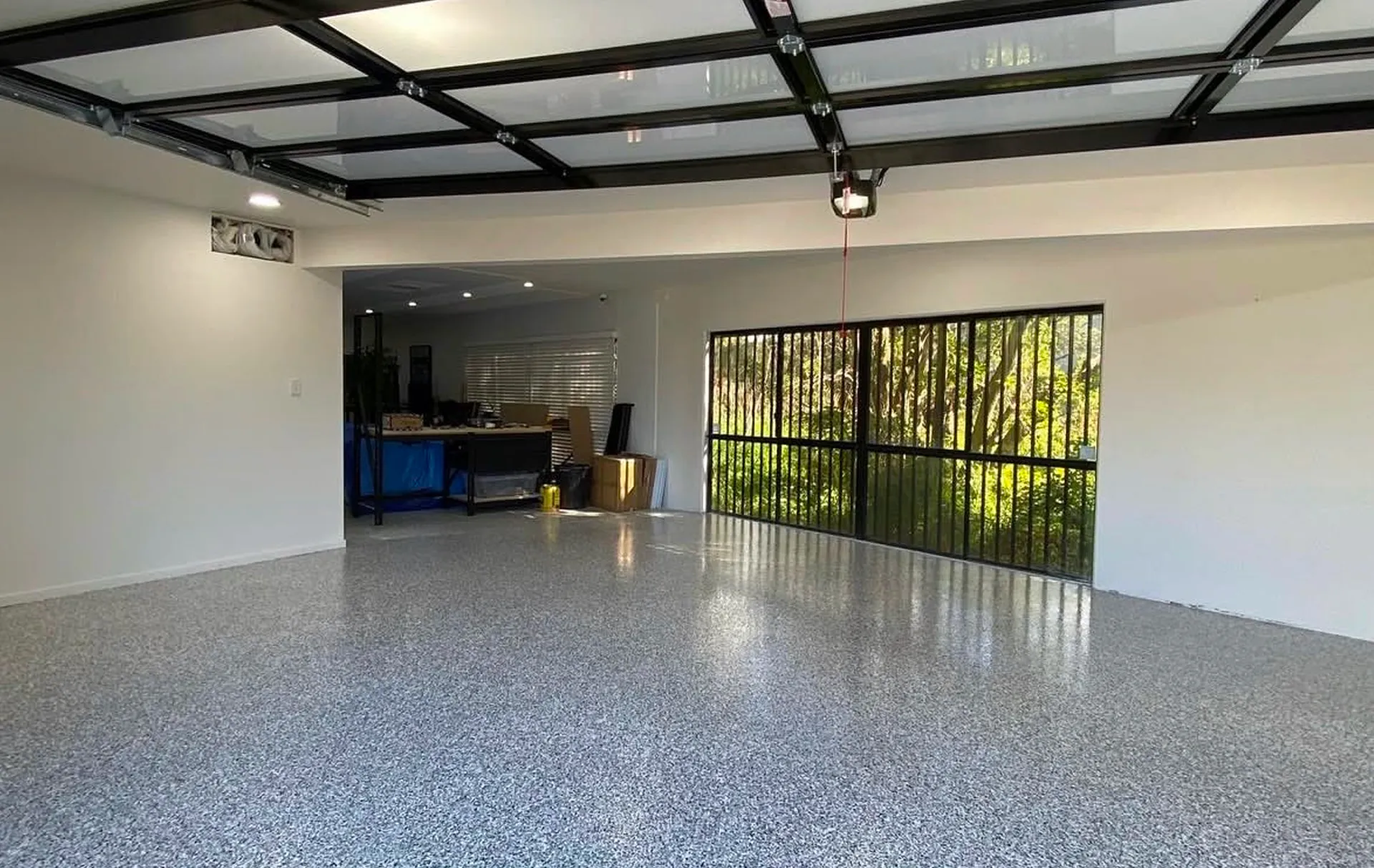 Showroom-grade flake garage floor by Open Scope Projects